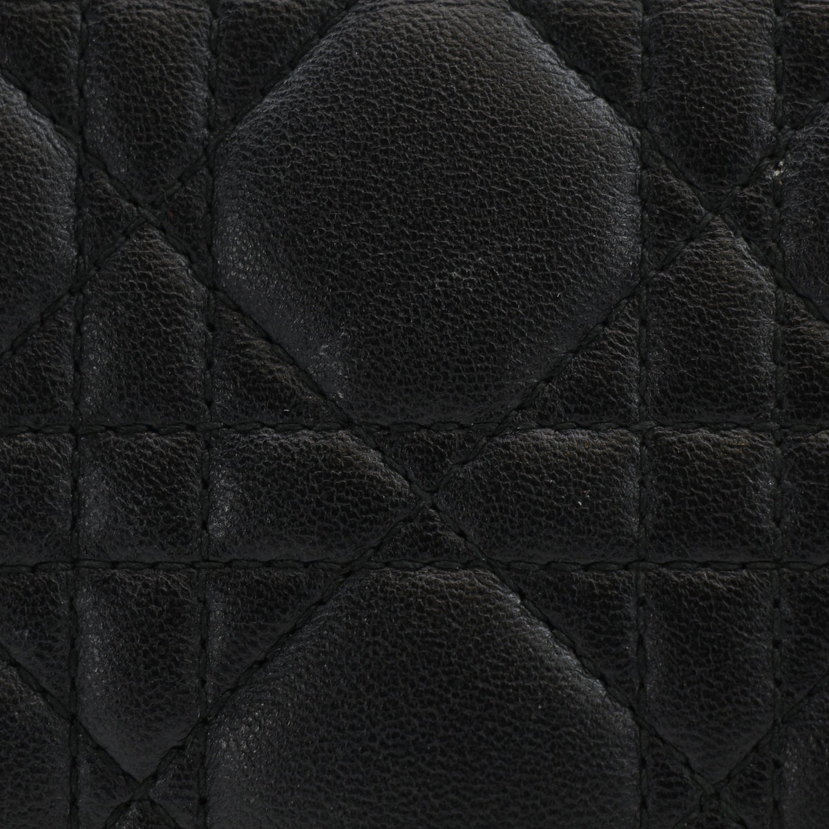 Black Christian Dior Dioraddict Cannage mini flap handbag with quilted design and chain strap