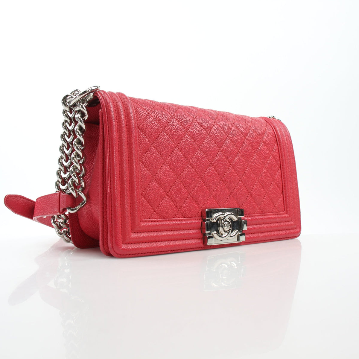 Red quilted caviar leather Chanel Boy handbag with chain strap and gold-tone hardware