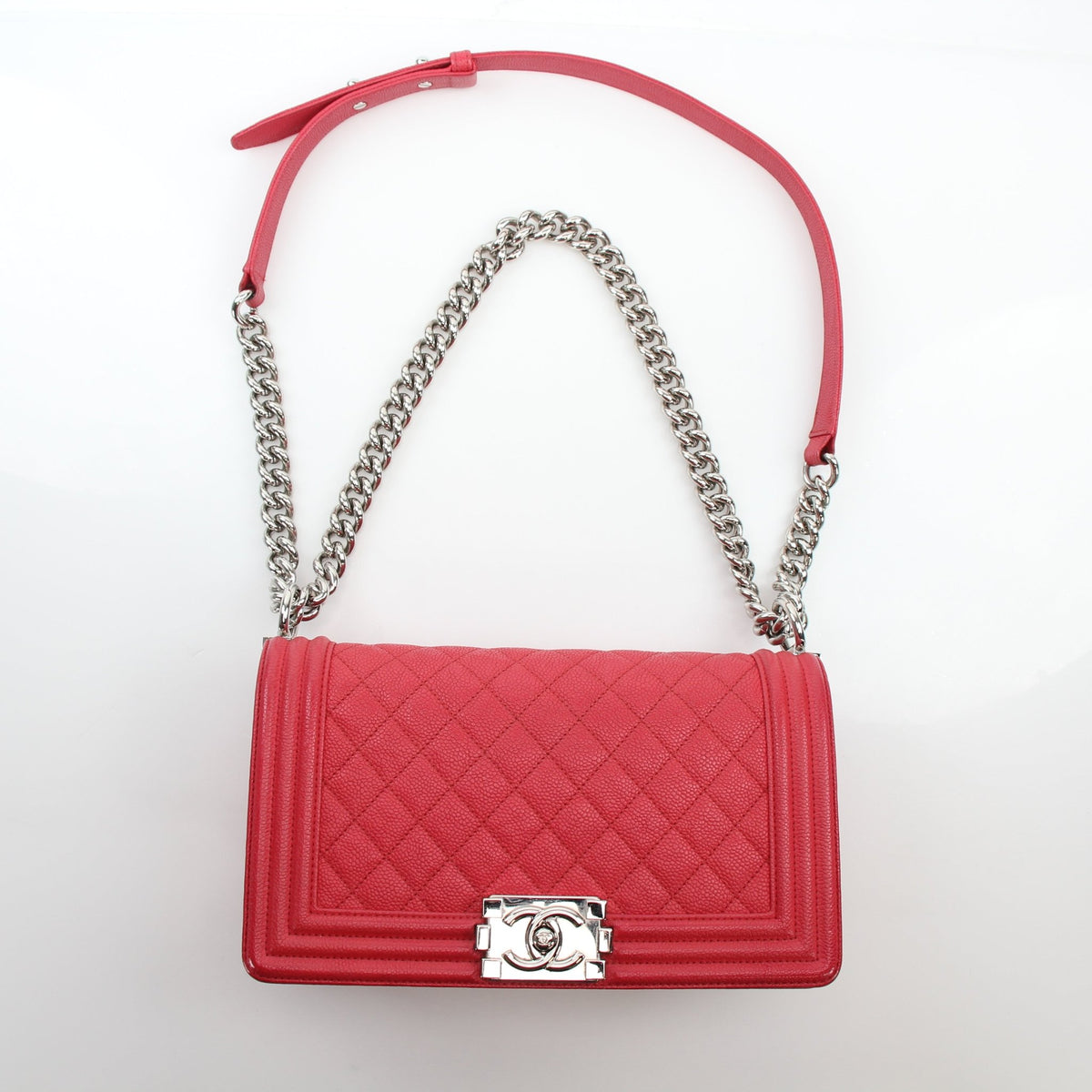 Red quilted caviar leather Chanel Boy handbag with chain strap by Gold & Beyond