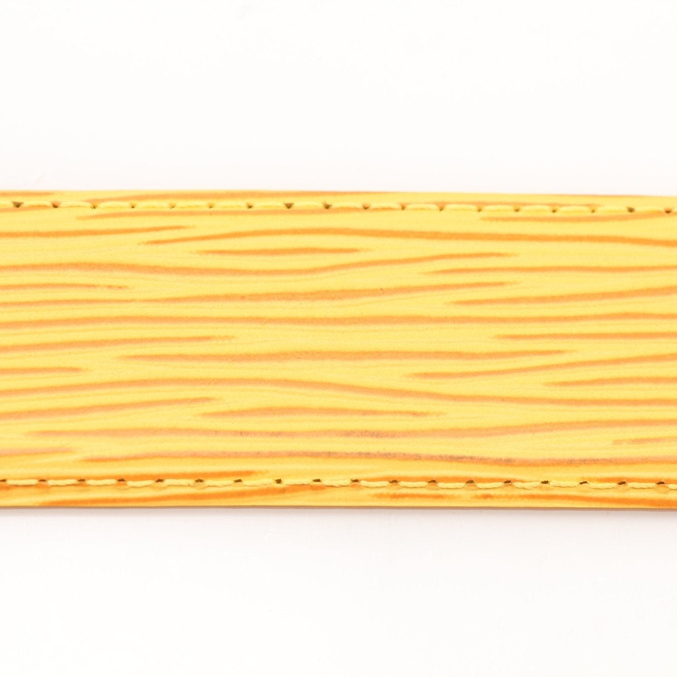 Louis Vuitton yellow belt from Gold & Beyond accessories collection with a sleek design and gold-tone buckle.