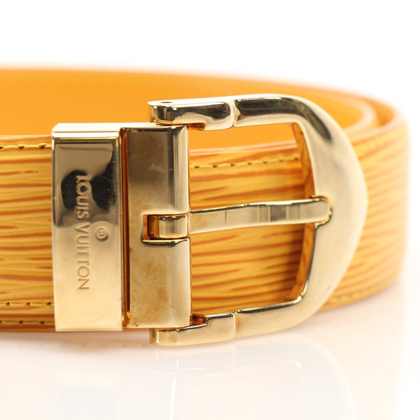 Yellow Louis Vuitton belt with gold buckle from Gold & Beyond accessories collection, displayed on a neutral background.