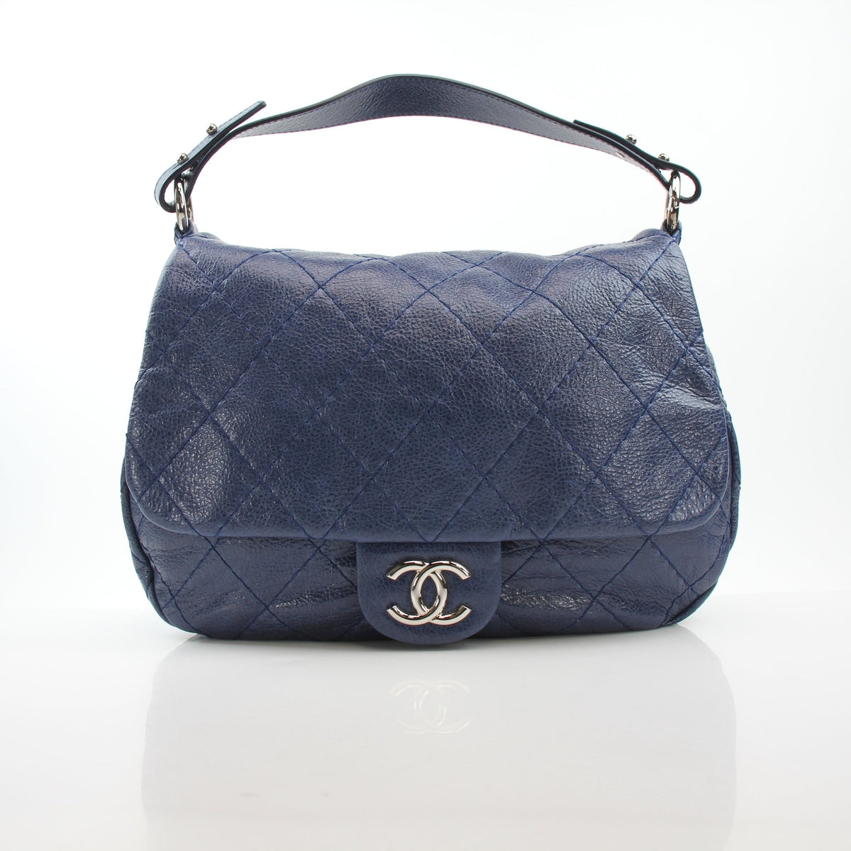 Chanel blue glazed calfskin XL On The Road flap bag handbag with structured silhouette and chain strap