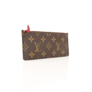 Louis Vuitton Félicie Pochette Insert Wallet with gold-tone accents, compact leather wallet showing multiple card slots and interior details.