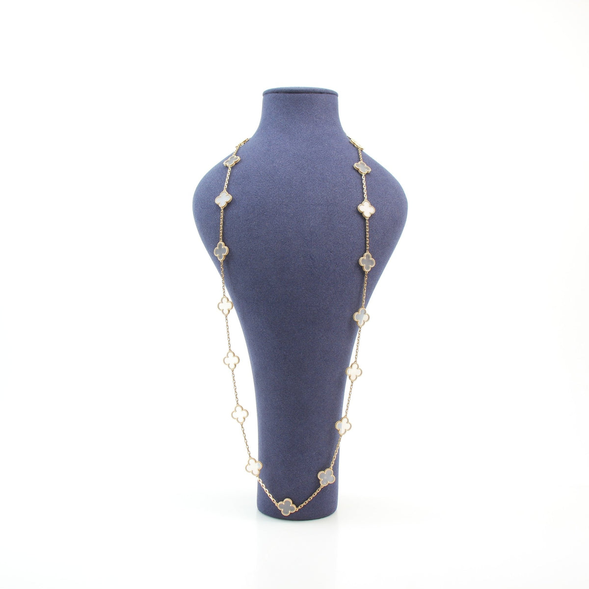 Van Cleef & Arpels Vintage Alhambra rock crystal 20-motif long necklace in jewelry display
