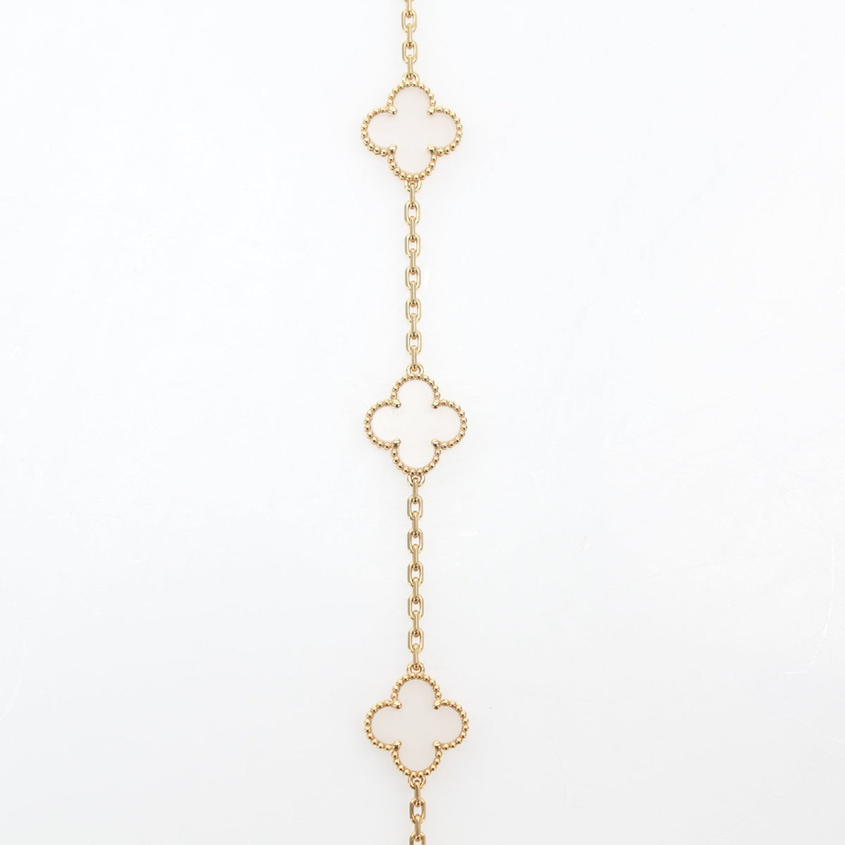 Van Cleef & Arpels Vintage Alhambra rock crystal 20-motif long necklace, jewelry detail view