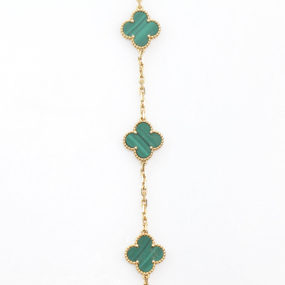 Van Cleef & Arpels Vintage Alhambra malachite 20-motif long necklace in green stone and gold jewelry design