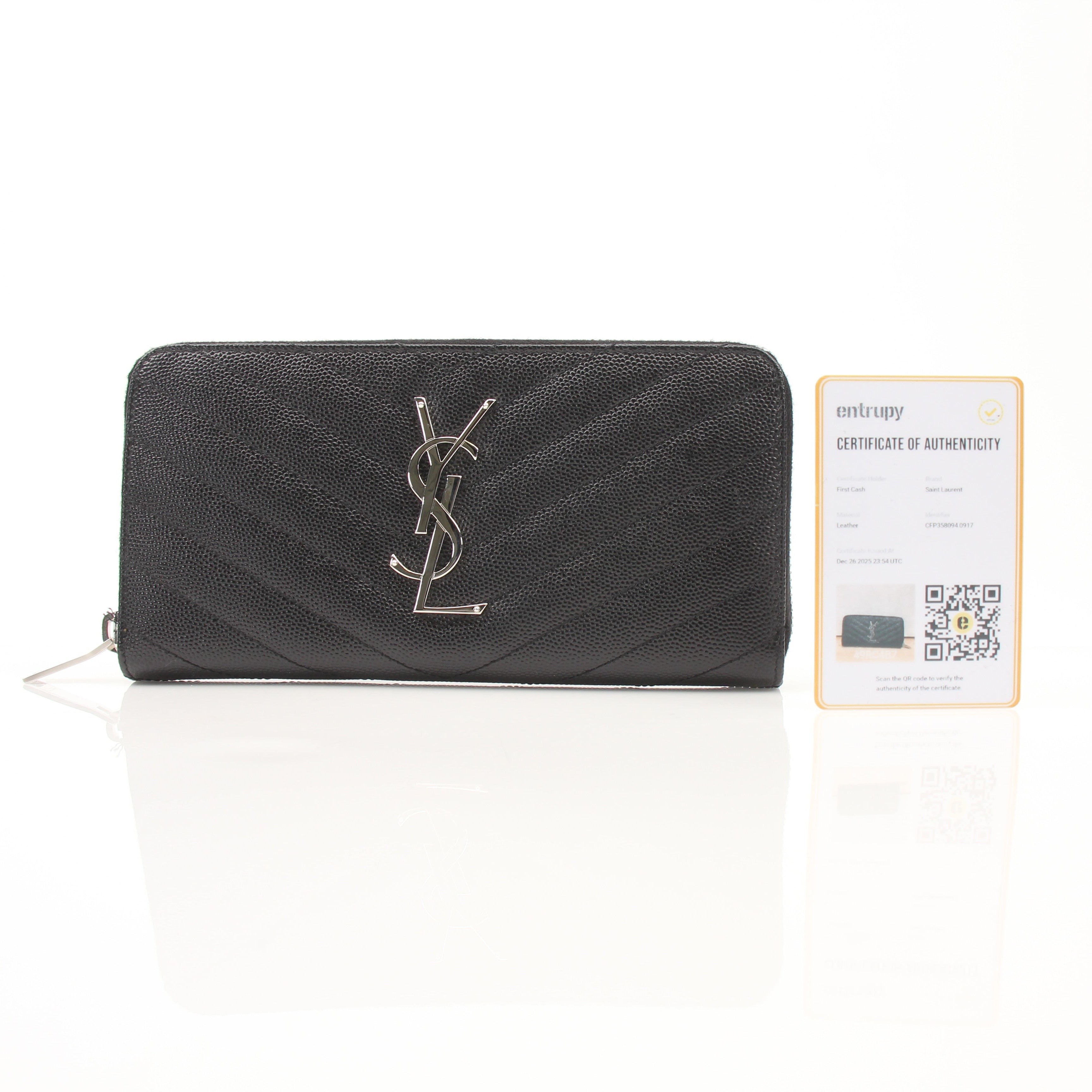 Gold & Beyond Saint Laurent Matelassé Chevron zip-around wallet with gold-tone hardware and textured leather finish.