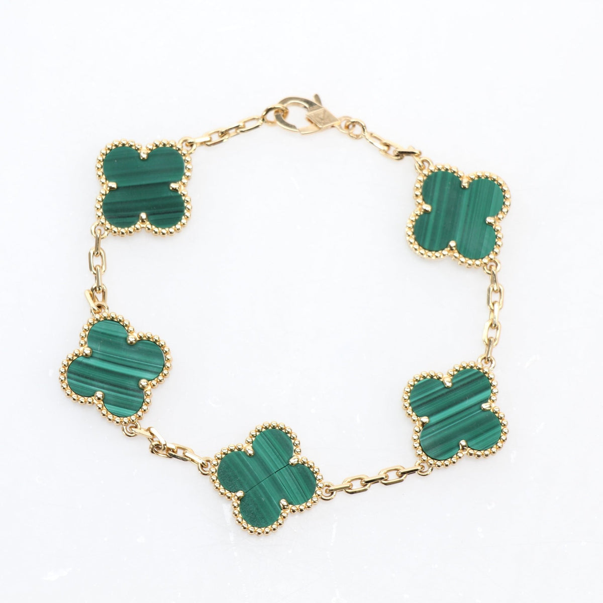 Van Cleef & Arpels Vintage Alhambra malachite 5-motif bracelet in green stone and gold-tone metal