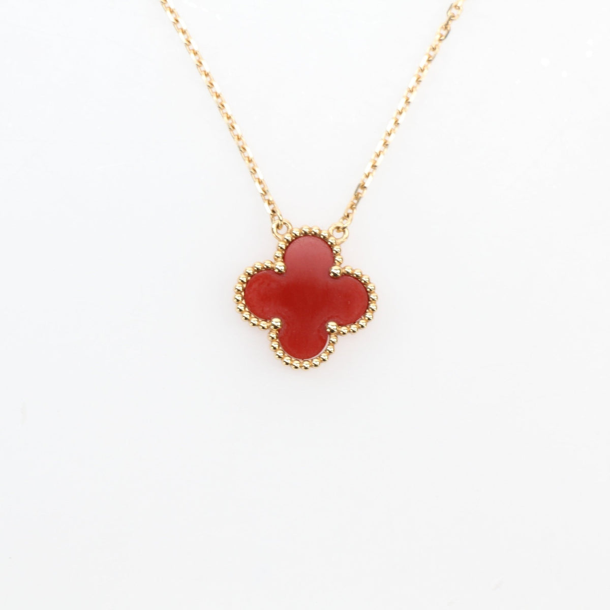Gold & Beyond Van Cleef & Arpels Vintage Alhambra carnelian pendant necklace in gold-tone setting