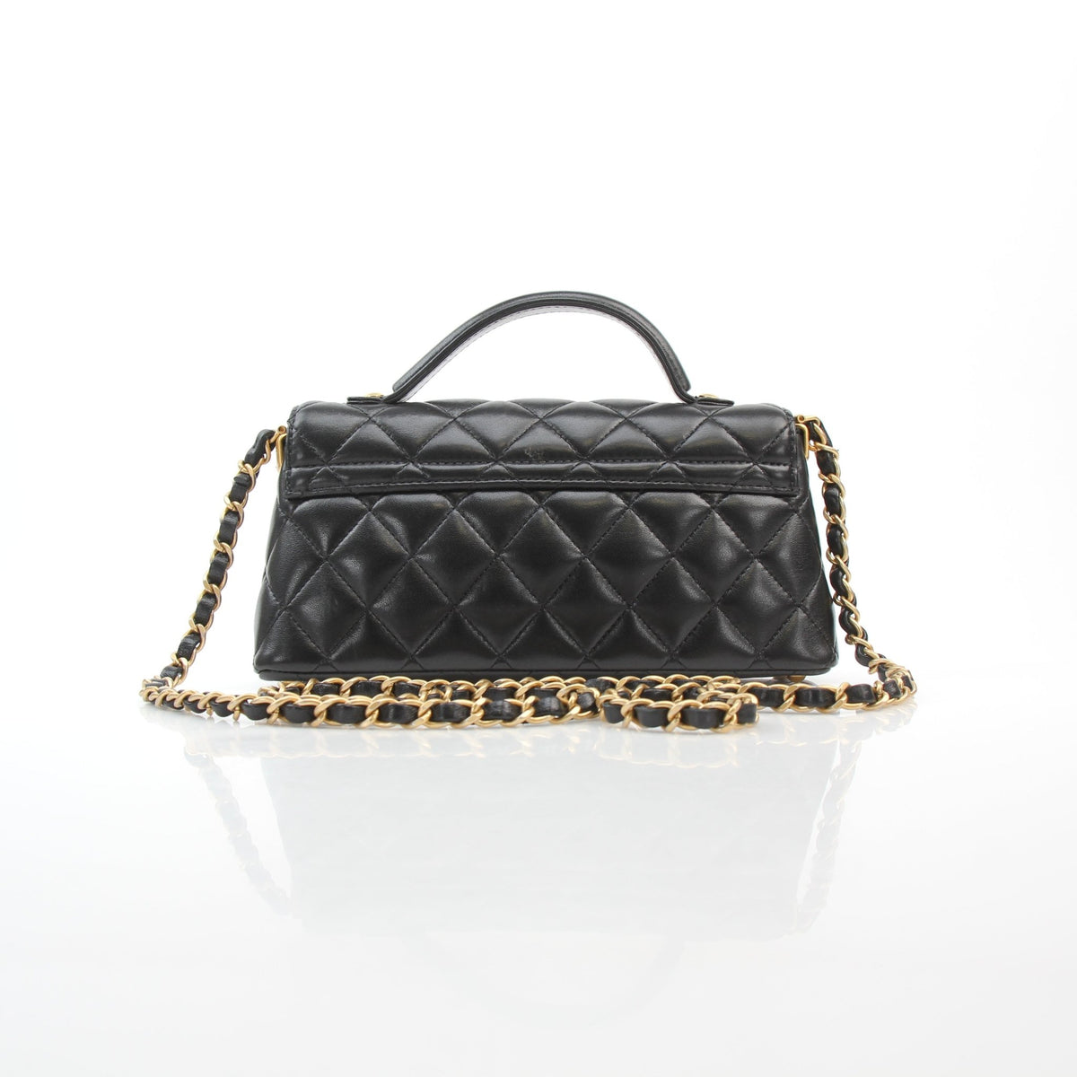 Chanel black lambskin mini flap bag with top handle, handbag by Gold & Beyond