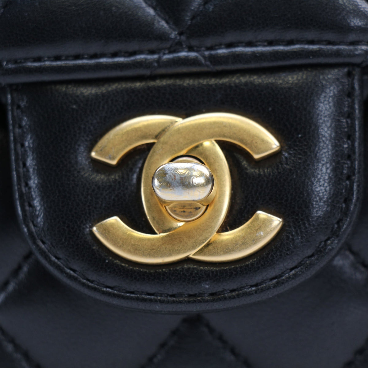 Chanel black lambskin mini flap bag with top handle handbag
