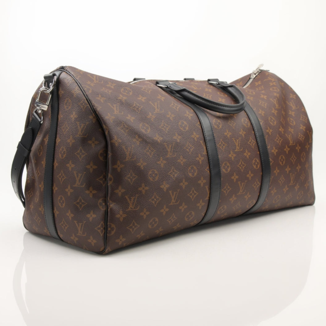 Louis Vuitton Keepall Bandoulière 55 travel bag by Gold & Beyond, showing the iconic monogram canvas with leather trim and handles.