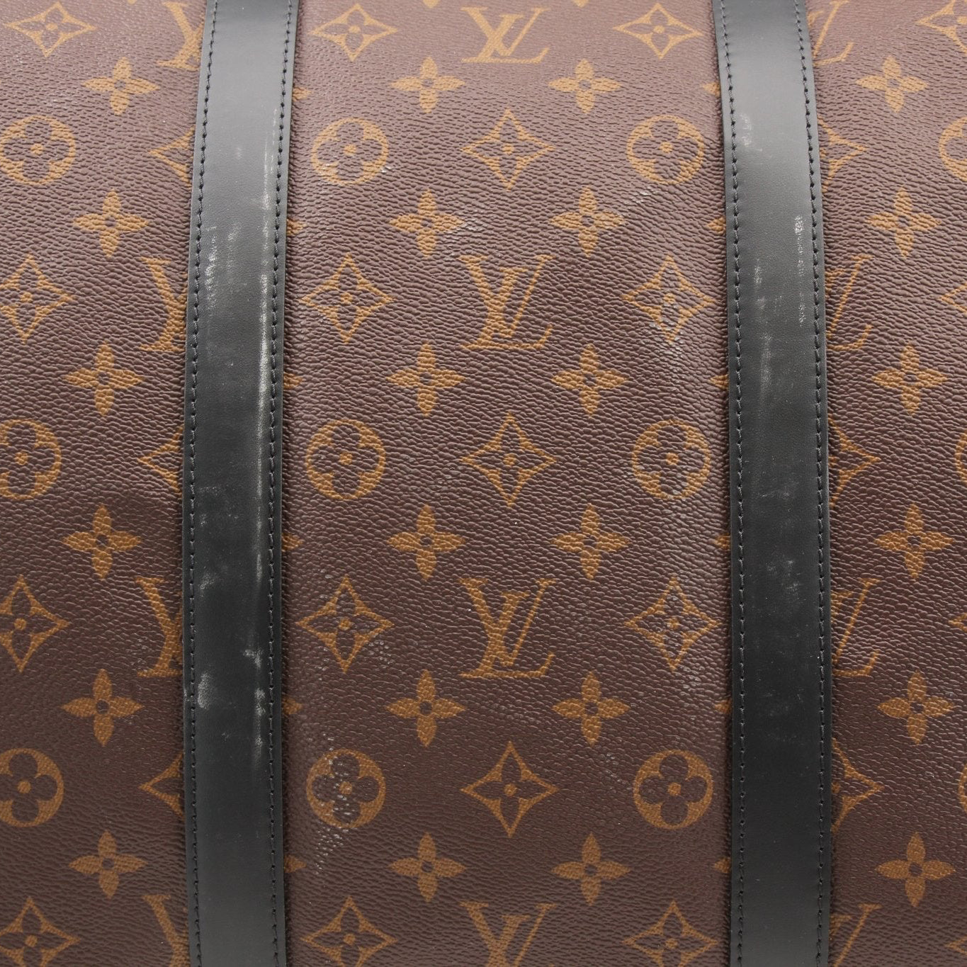 Louis Vuitton Keepall Bandoulière 55 travel bag by Gold & Beyond, showing the classic monogram canvas and leather accents.