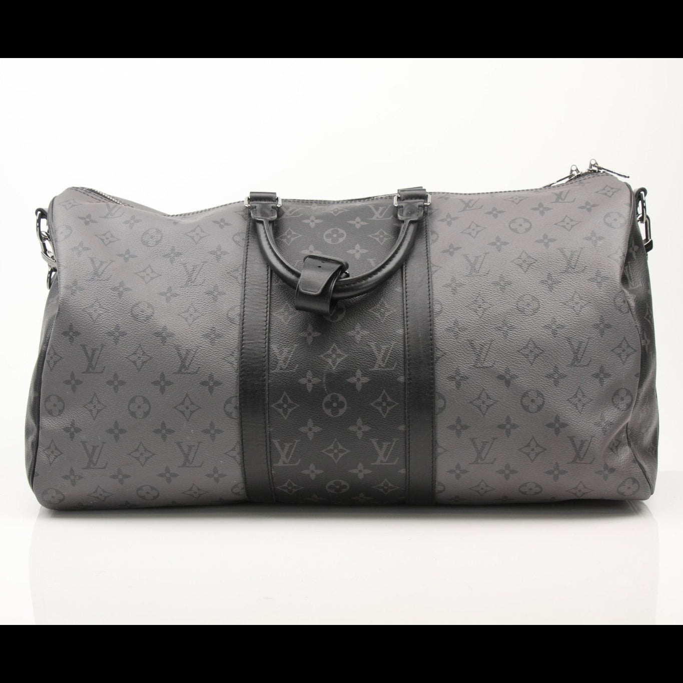 Louis Vuitton Keepall 50 Bandoulière travel bag with leather handles and gold hardware, displayed on a neutral background.