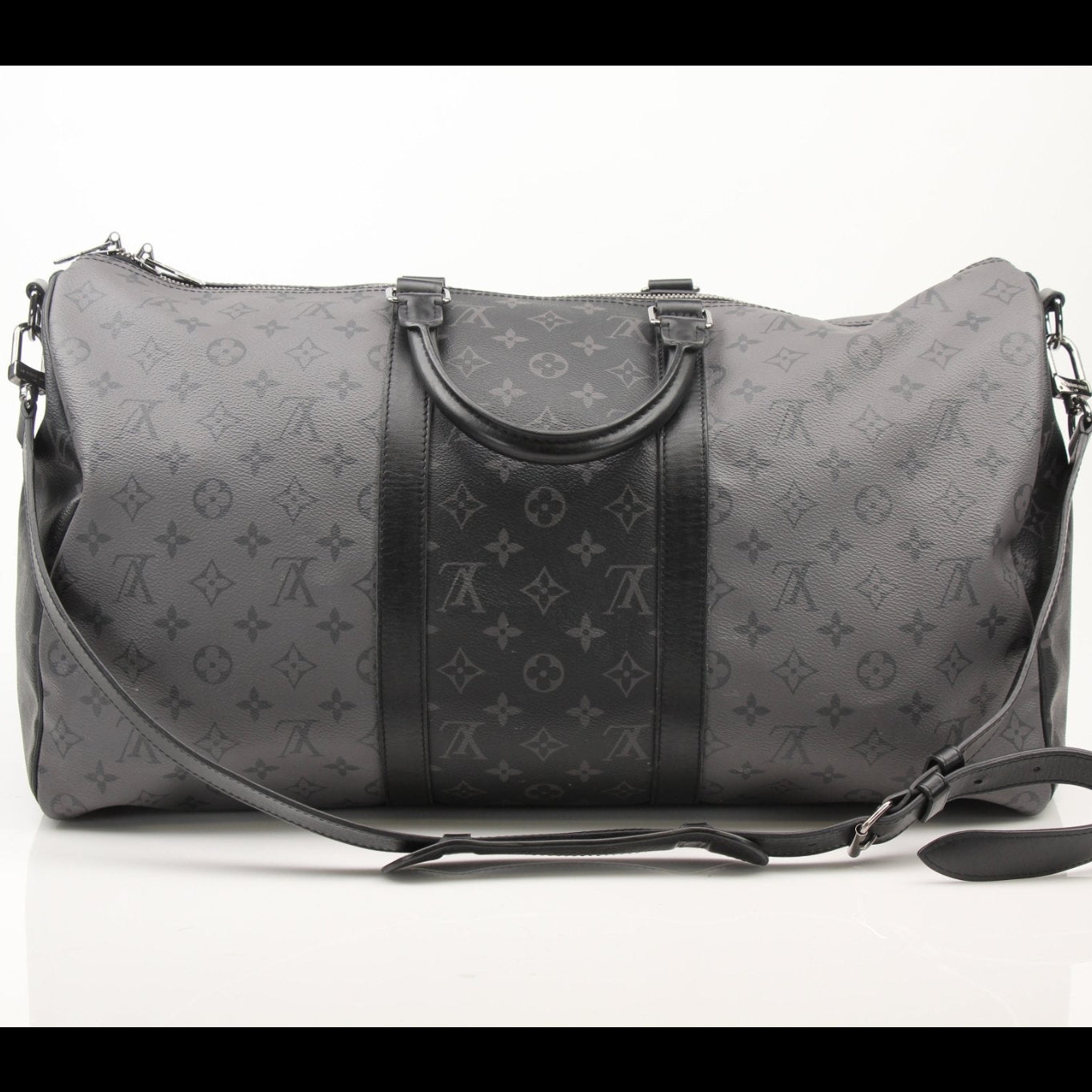 Louis Vuitton Keepall 50 Bandoulière travel bag by Gold & Beyond, showcasing black monogram canvas and leather handles.