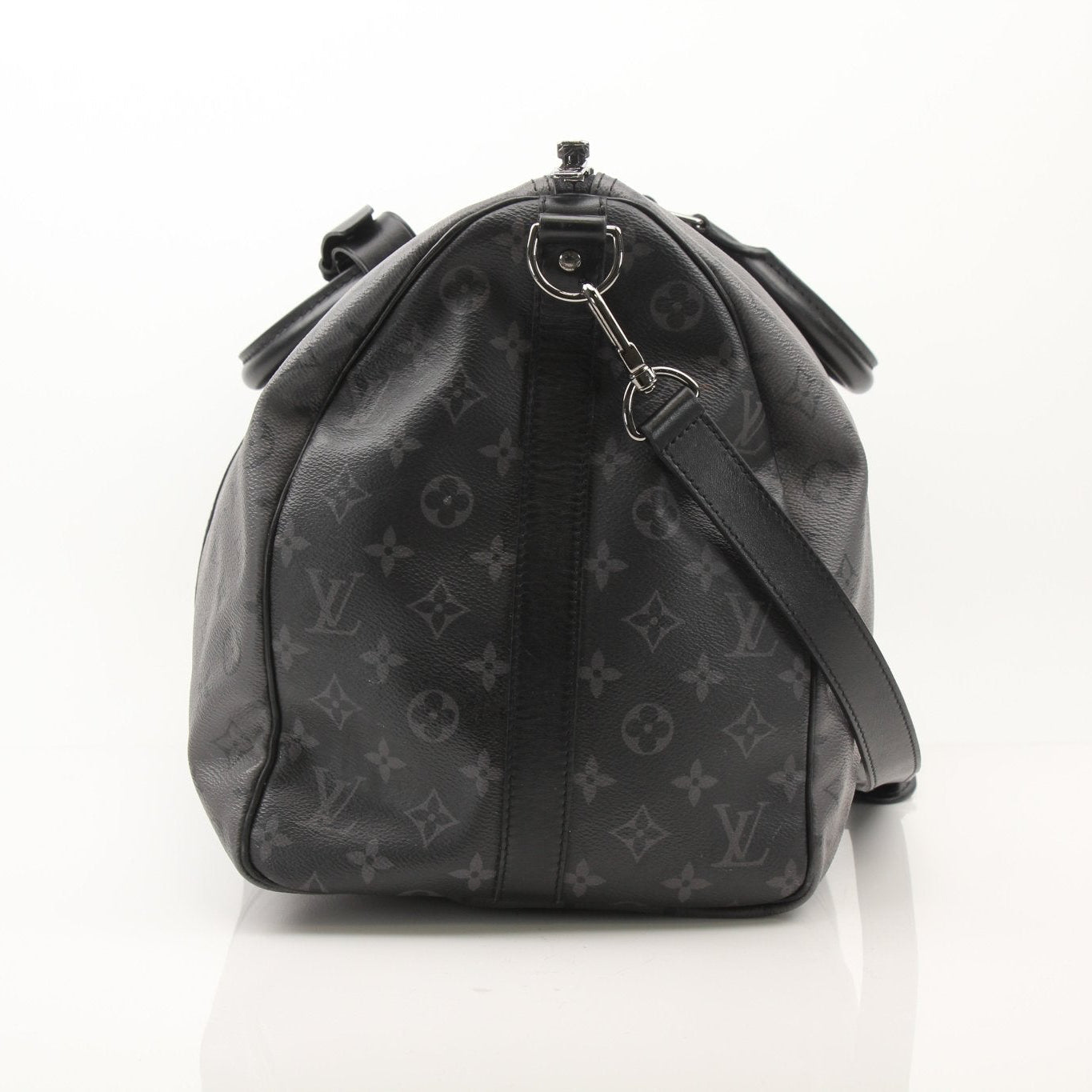 Gold & Beyond Louis Vuitton Keepall 50 travel bag with adjustable bandoulière, showcasing the iconic monogram canvas and leather accents.