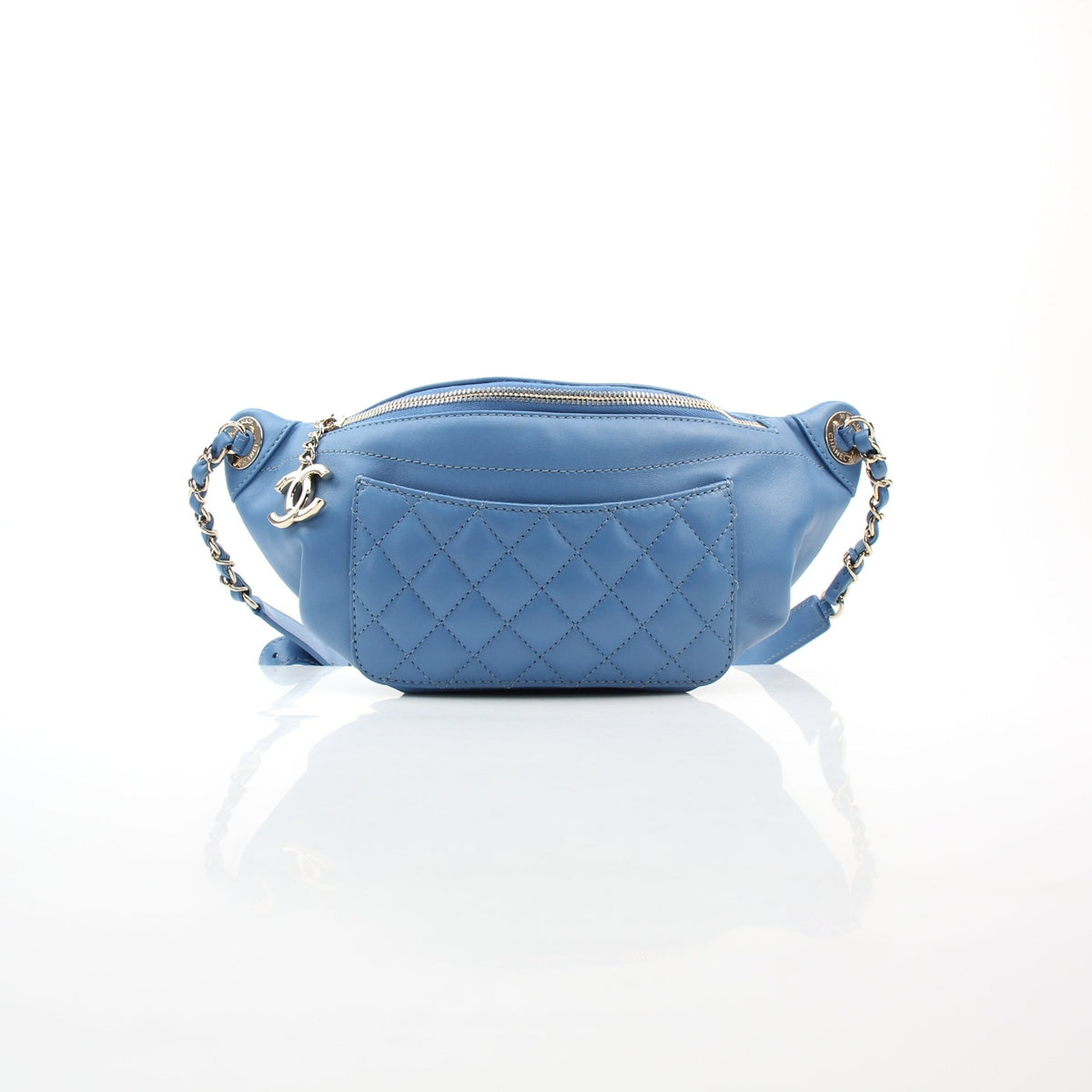 Blue lambskin leather bi-quilted classic waist bag by Chanel, featuring a compact handbag design