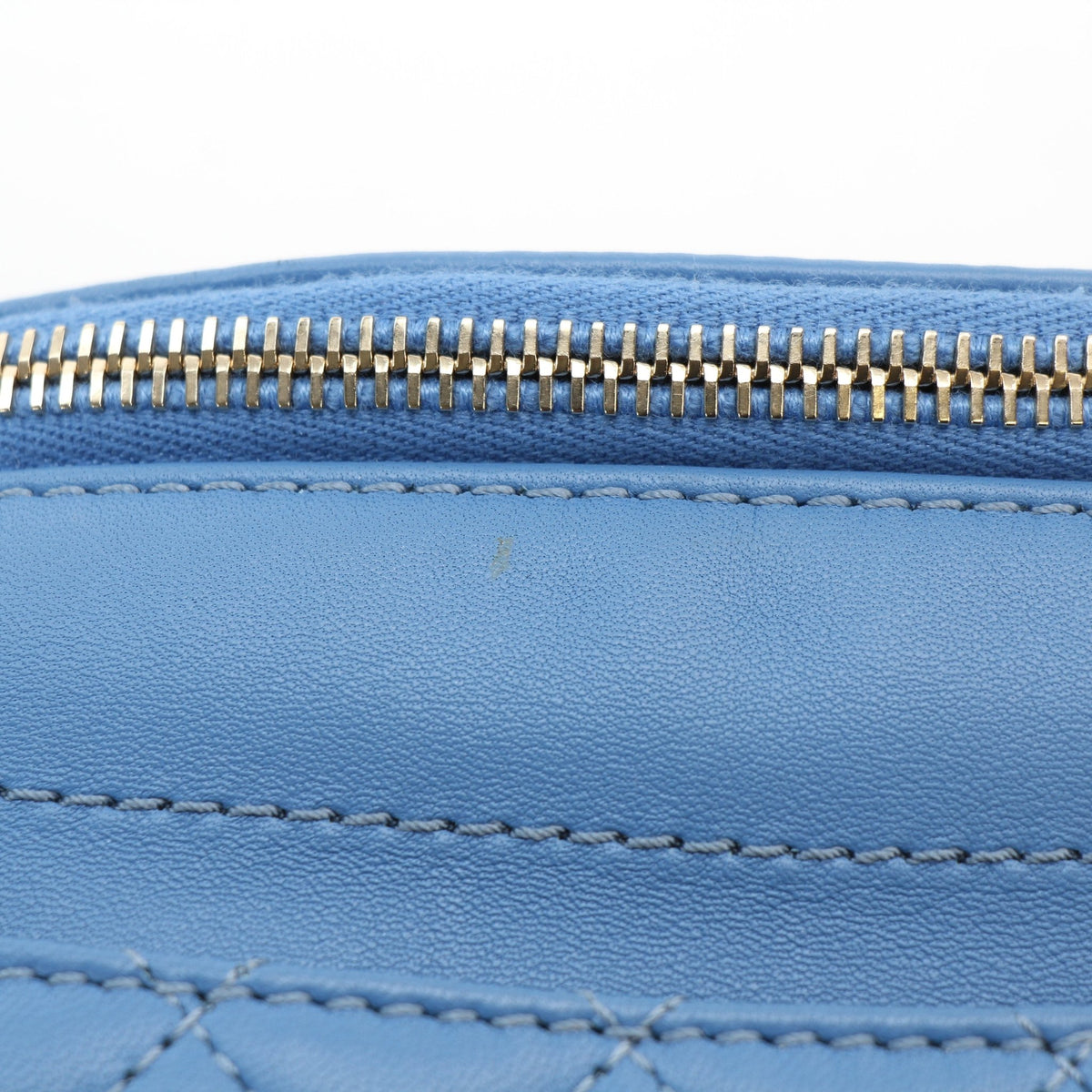 Chanel blue lambskin leather bi-quilted classic waist bag, shown as a handbag by Gold & Beyond