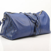 Louis Vuitton Blue Keepall 50 Bandoulière duffle bag for travel, featuring iconic monogram canvas and leather accents.