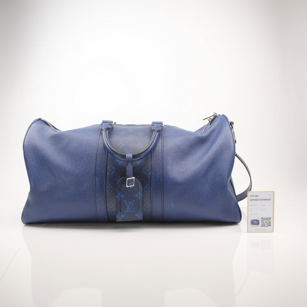 Louis Vuitton Blue Keepall 50 Bandoulière duffle bag for travel, featuring signature monogram canvas and leather trim.