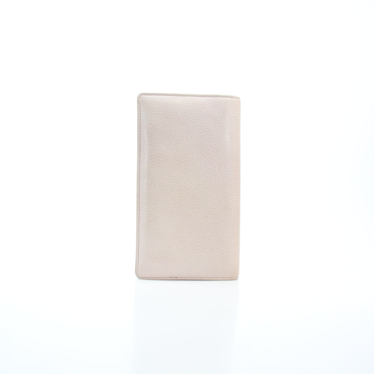 Chanel light pink leather camellia yen wallet by Gold & Beyond, viewed from the front