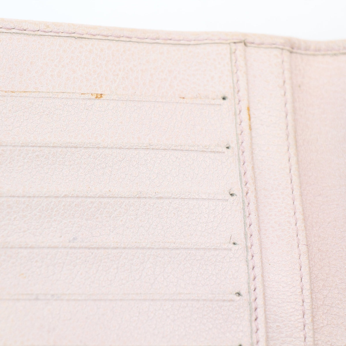 Chanel light pink leather camellia yen wallet by Gold & Beyond