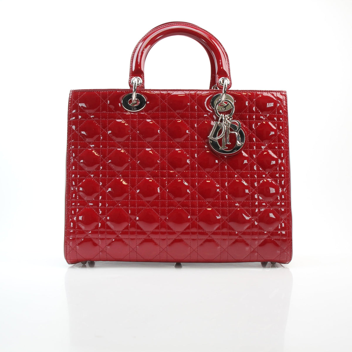 Christian Dior red patent leather large Lady Dior handbag with structured silhouette and top handles