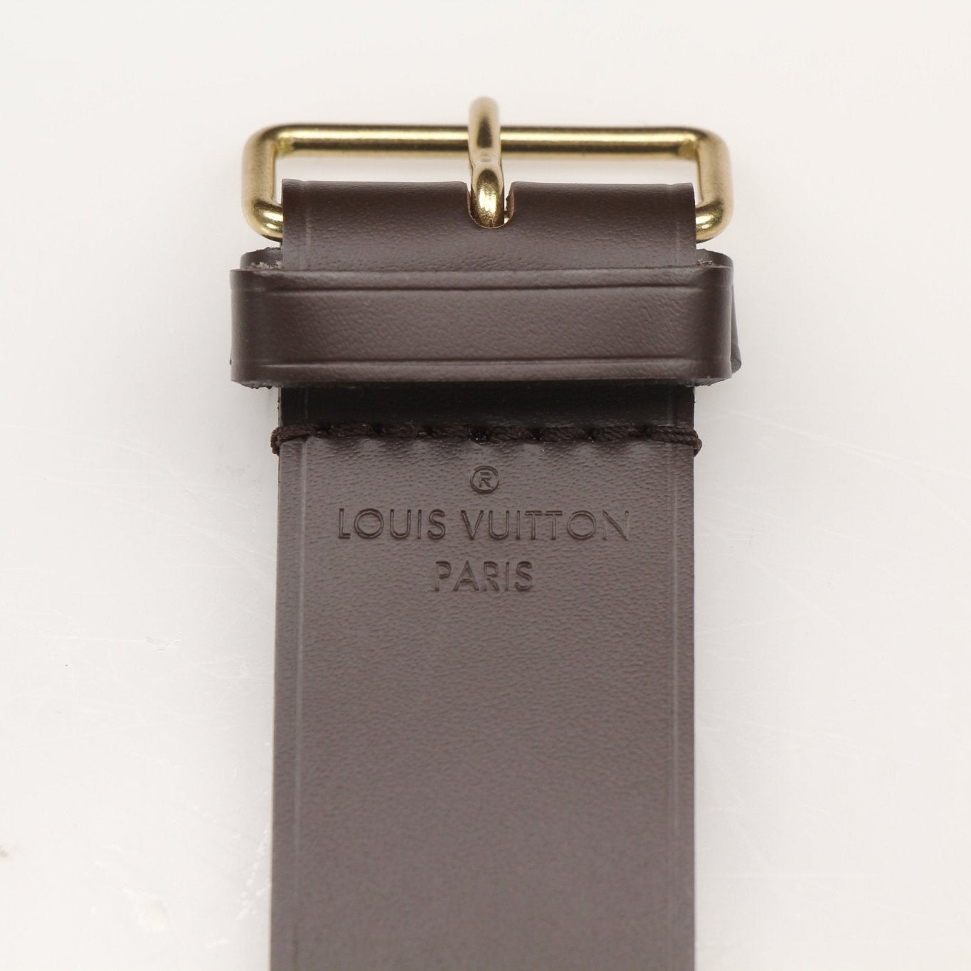 Louis Vuitton Keepall 50 Damier Ebene duffle bag with leather trim, showcasing its spacious travel bag design and signature pattern.