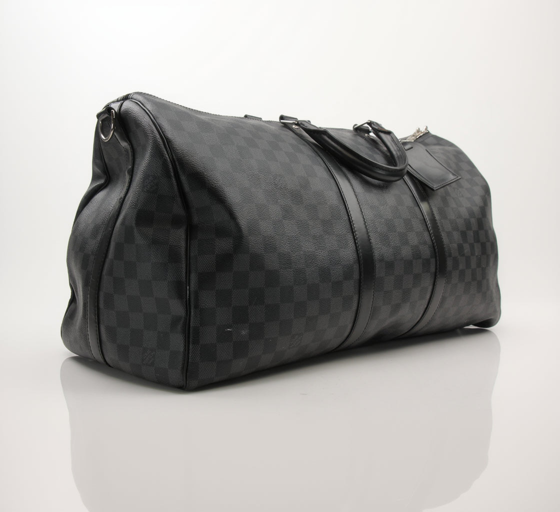 Gold & Beyond Louis Vuitton Keepall 55 Bandoulière travel bag with monogram canvas and leather trim, front view with handles and zipper.