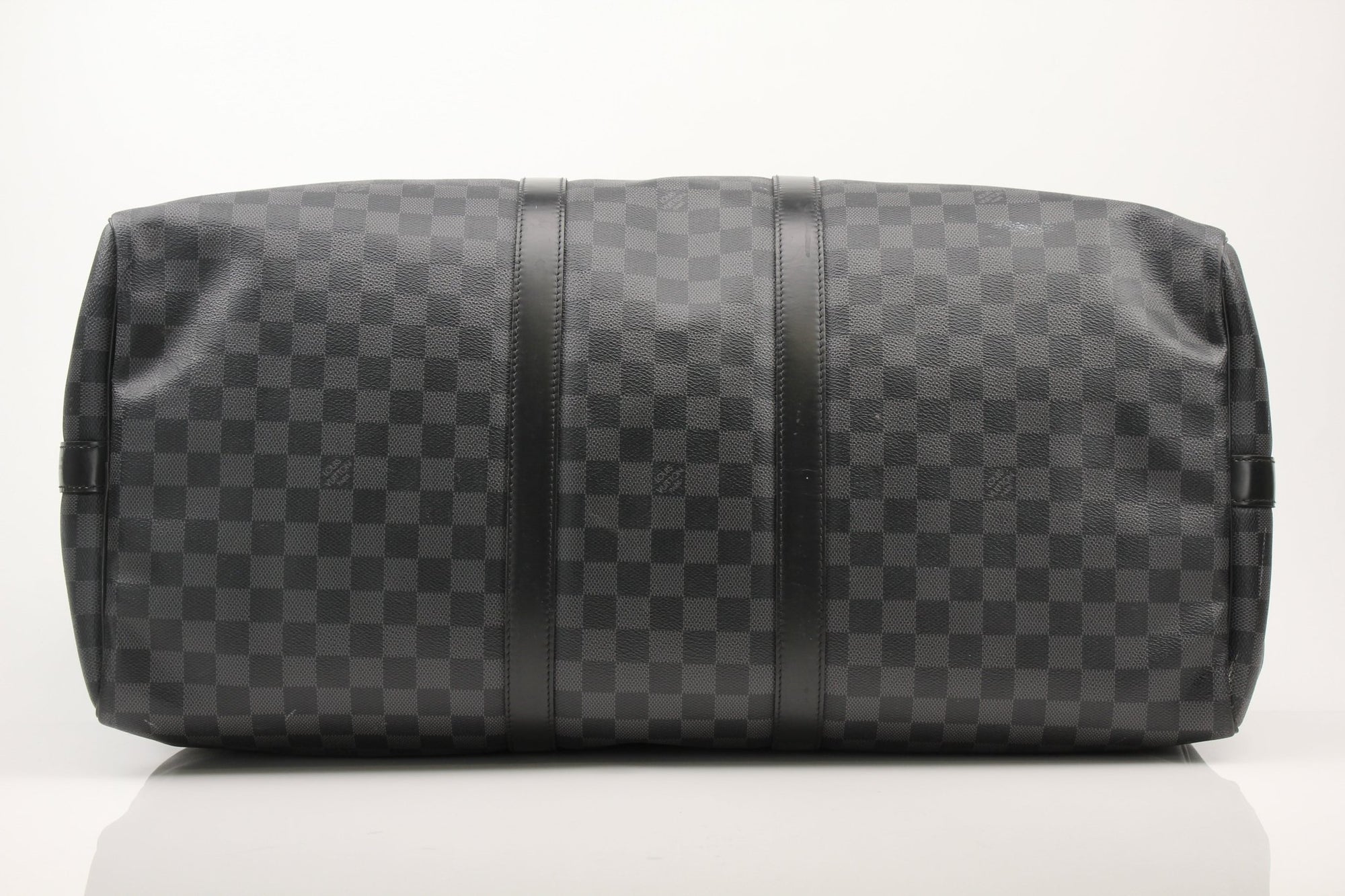 Gold & Beyond Louis Vuitton Keepall 55 Bandoulière travel bag in classic monogram canvas with leather accents.