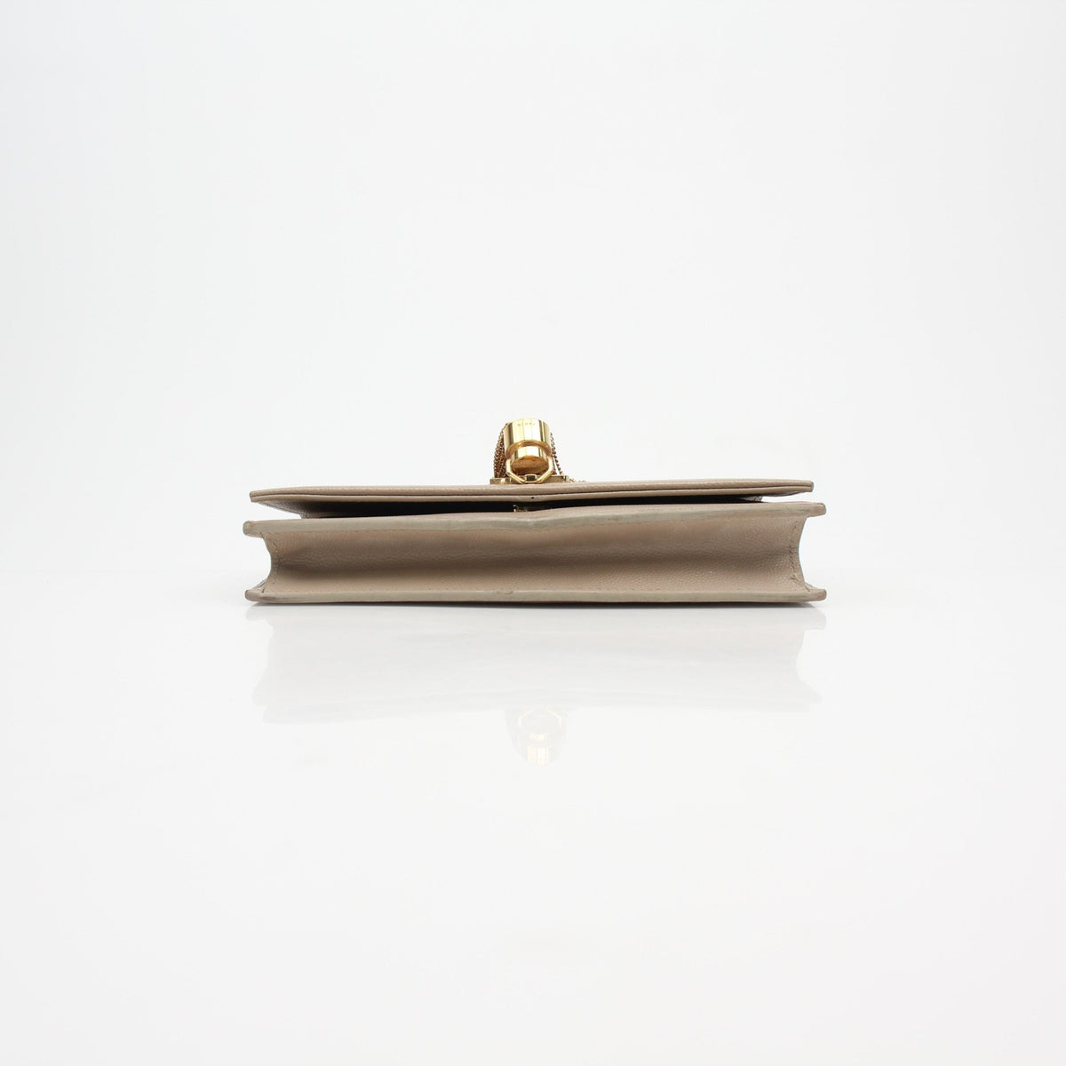 Gold & Beyond Saint Laurent Kate Tassel Wallet on Chain handbag with gold accents and tassel details, close-up view of the stylish accessory.