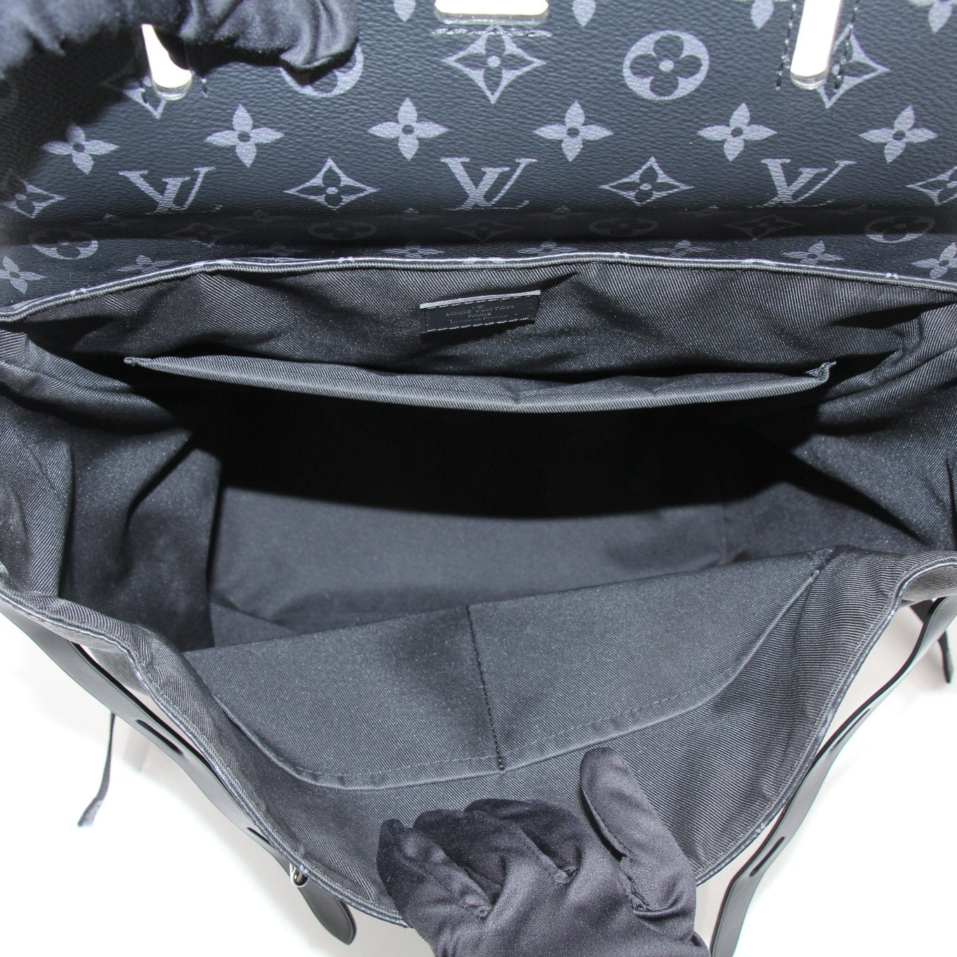 Louis Vuitton Steamer Backpack by Gold &amp; Beyond, stylish travel bag with leather accents and multiple compartments.