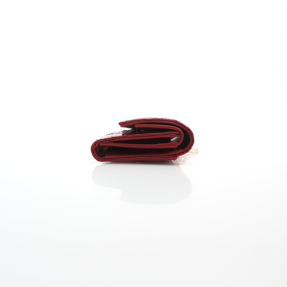 Christian Dior red Lady Dior Lotus wallet by Gold & Beyond, showing quilted leather and signature charm details