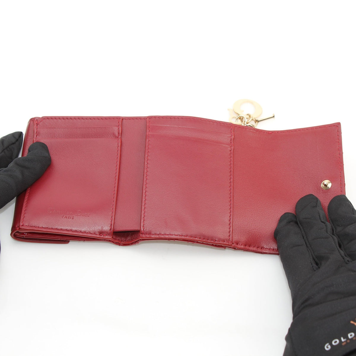 Christian Dior Red Lady Dior Lotus Wallet by Gold & Beyond, showing its structured design and signature quilted texture