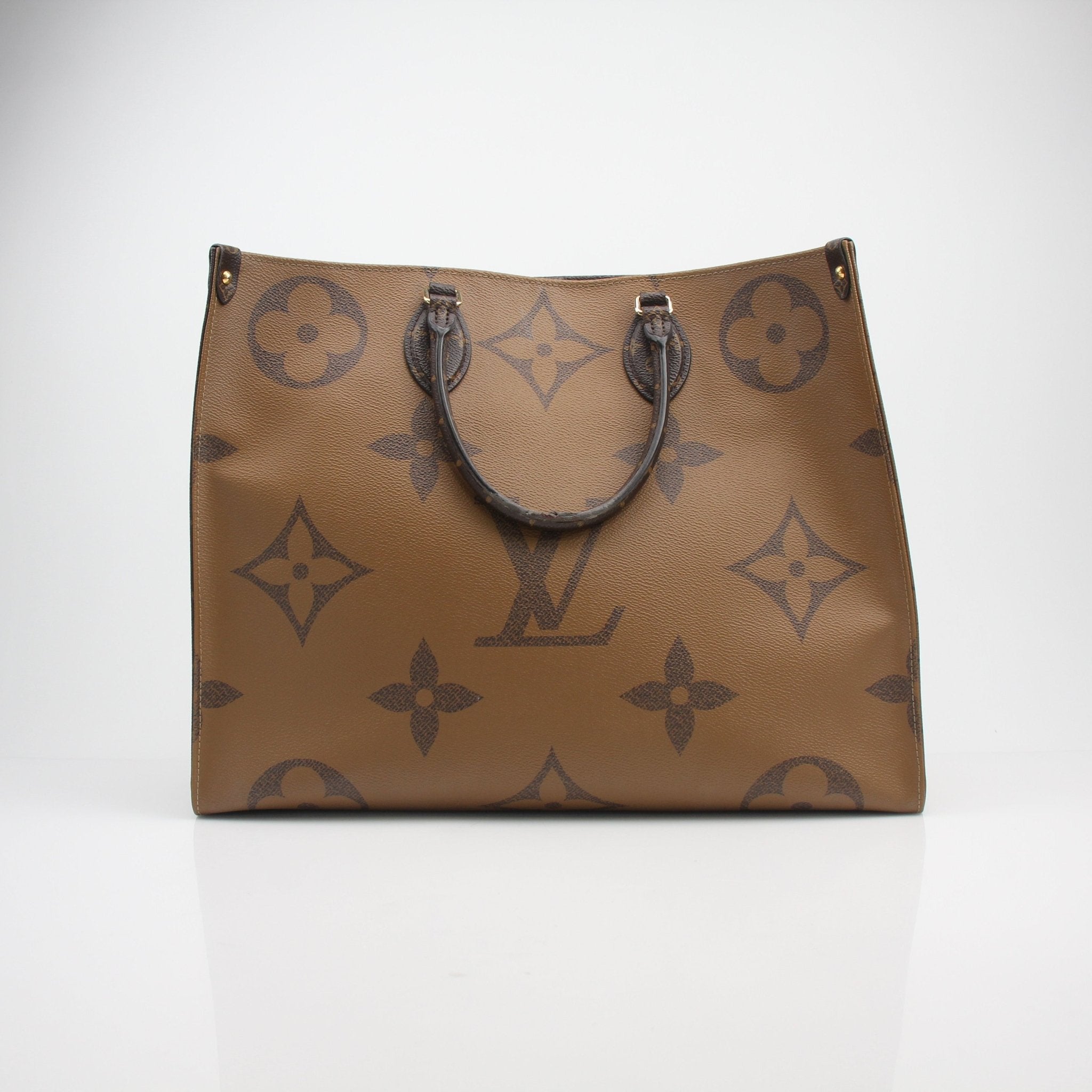 Louis Vuitton Reverse Monogram Giant OnTheGo GM tote handbag with gold-tone hardware and dual top handles.