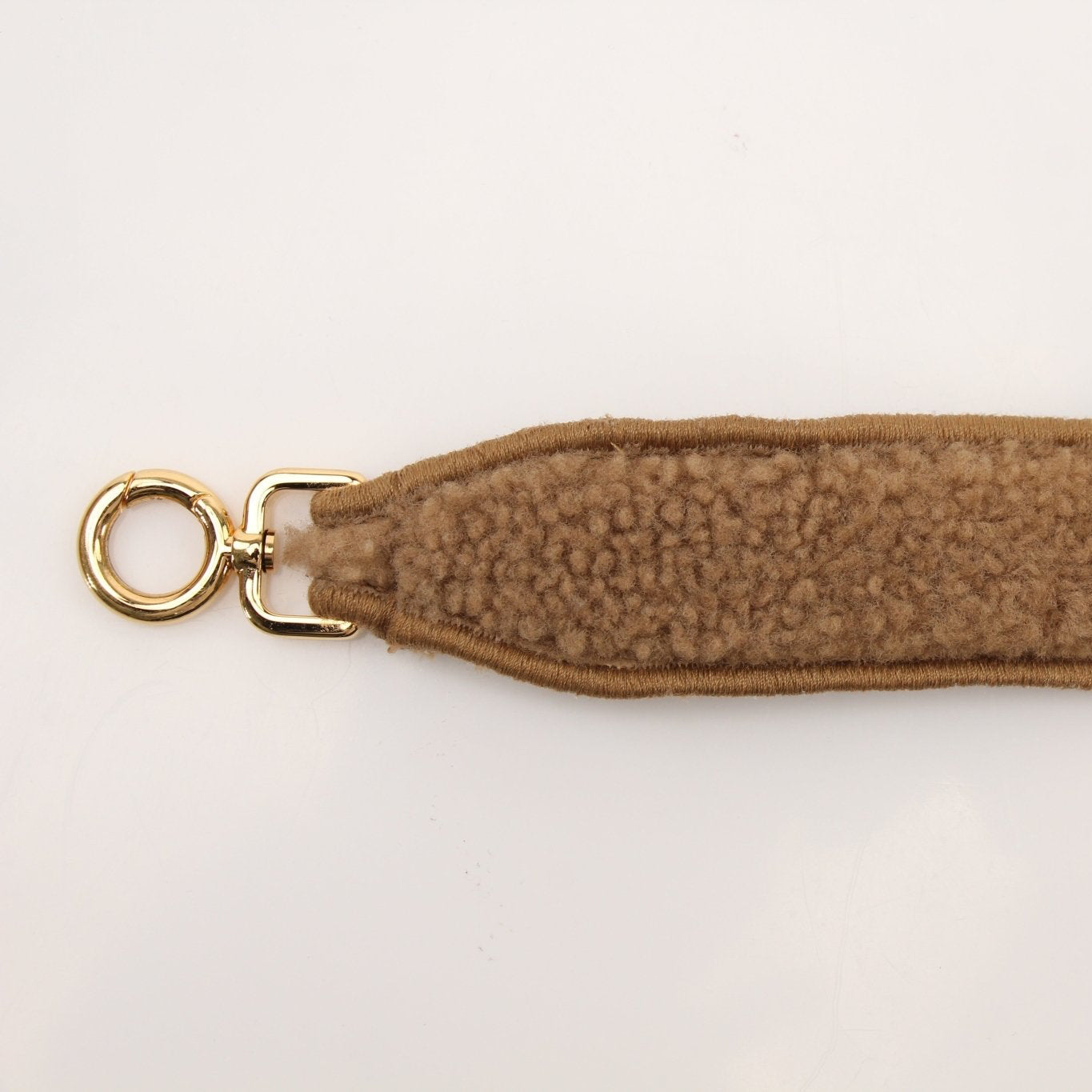 Fendi Shearling First Camel handbag with gold hardware, soft shearling exterior, and structured design.