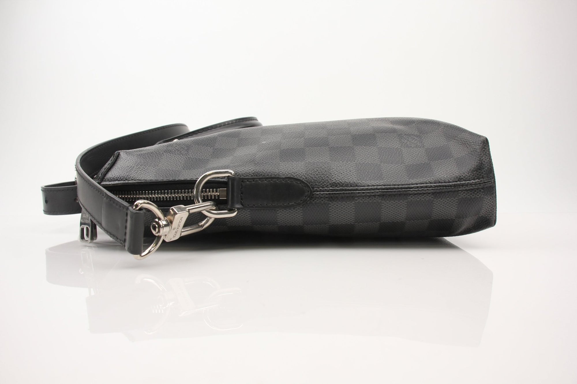 Gold & Beyond Louis Vuitton Porte-Documents Voya briefcase for travel, featuring sleek design and leather accents.