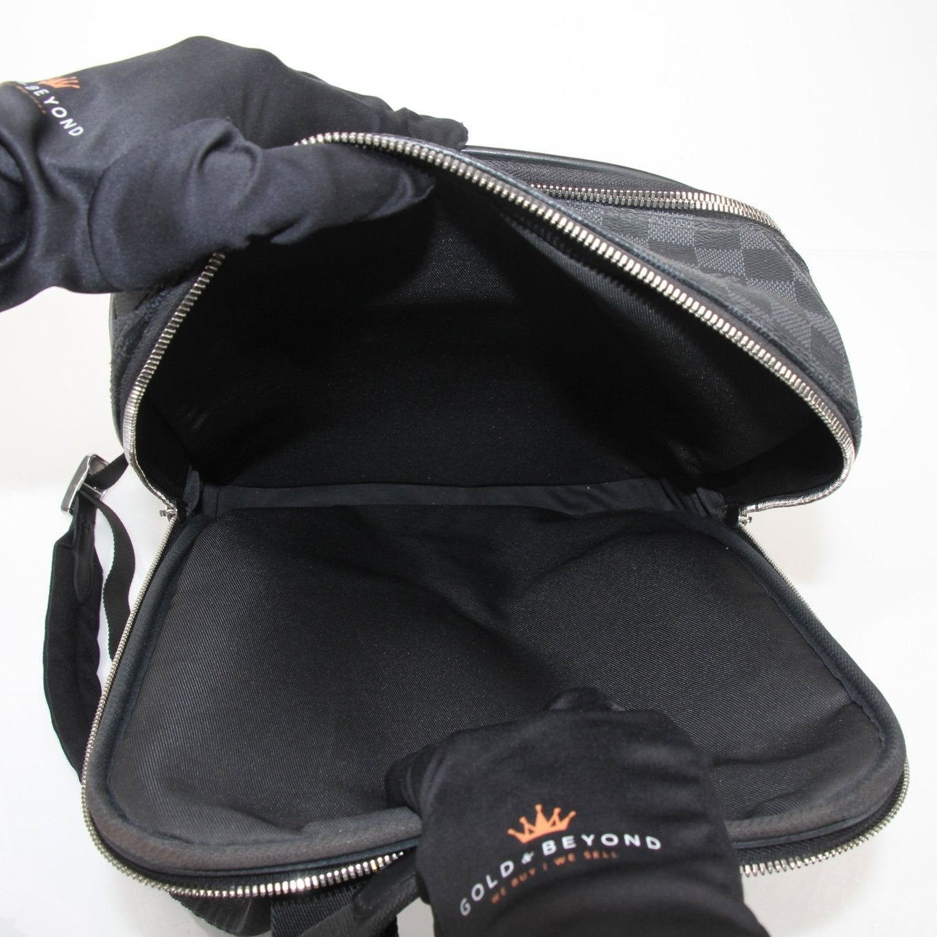 Louis Vuitton Michael backpack, a stylish travel bag from Gold &amp; Beyond, featuring leather accents and spacious compartments.