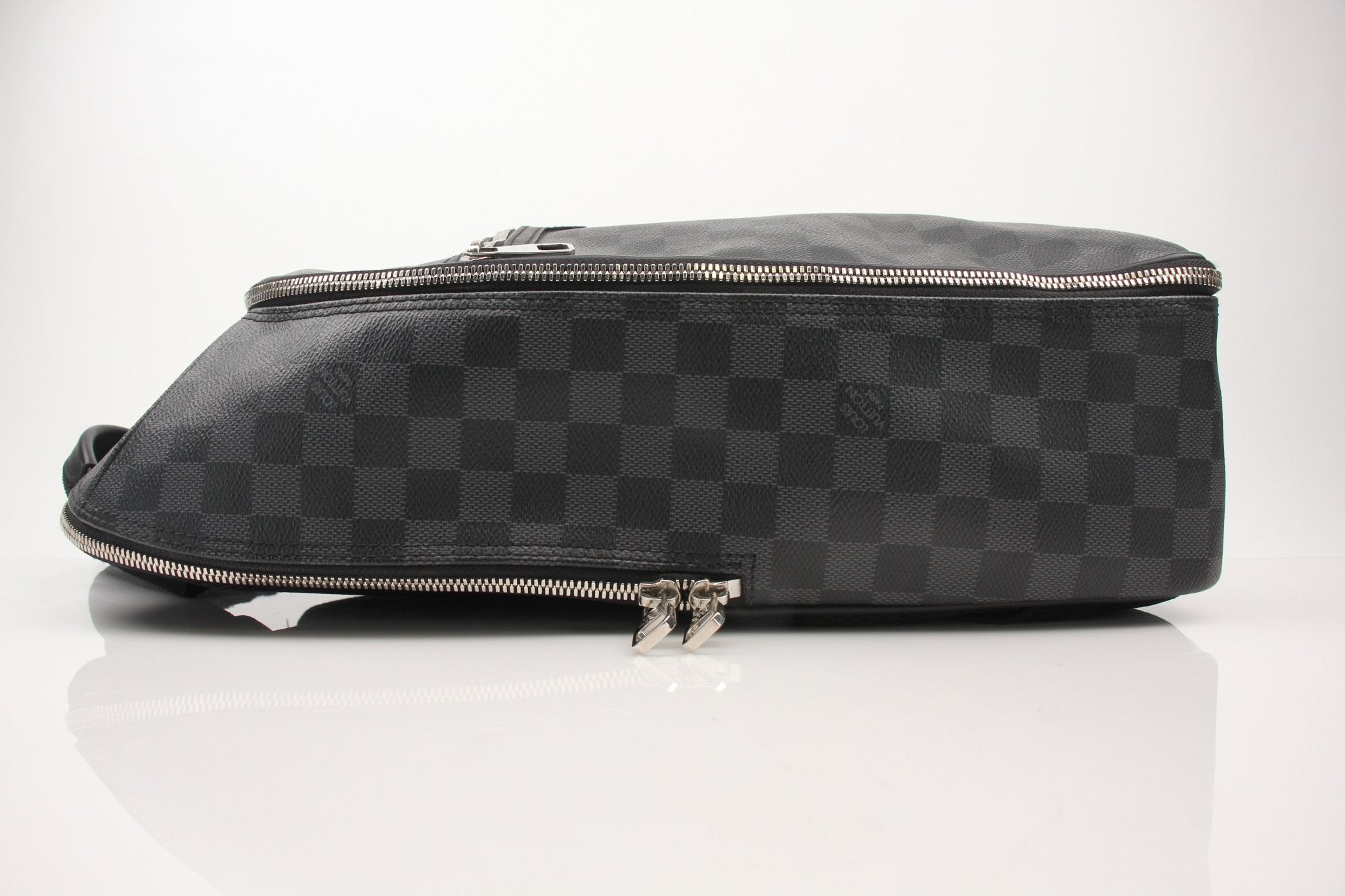 Louis Vuitton Michael Backpack, a stylish travel bag from Gold & Beyond with leather straps and spacious interior.