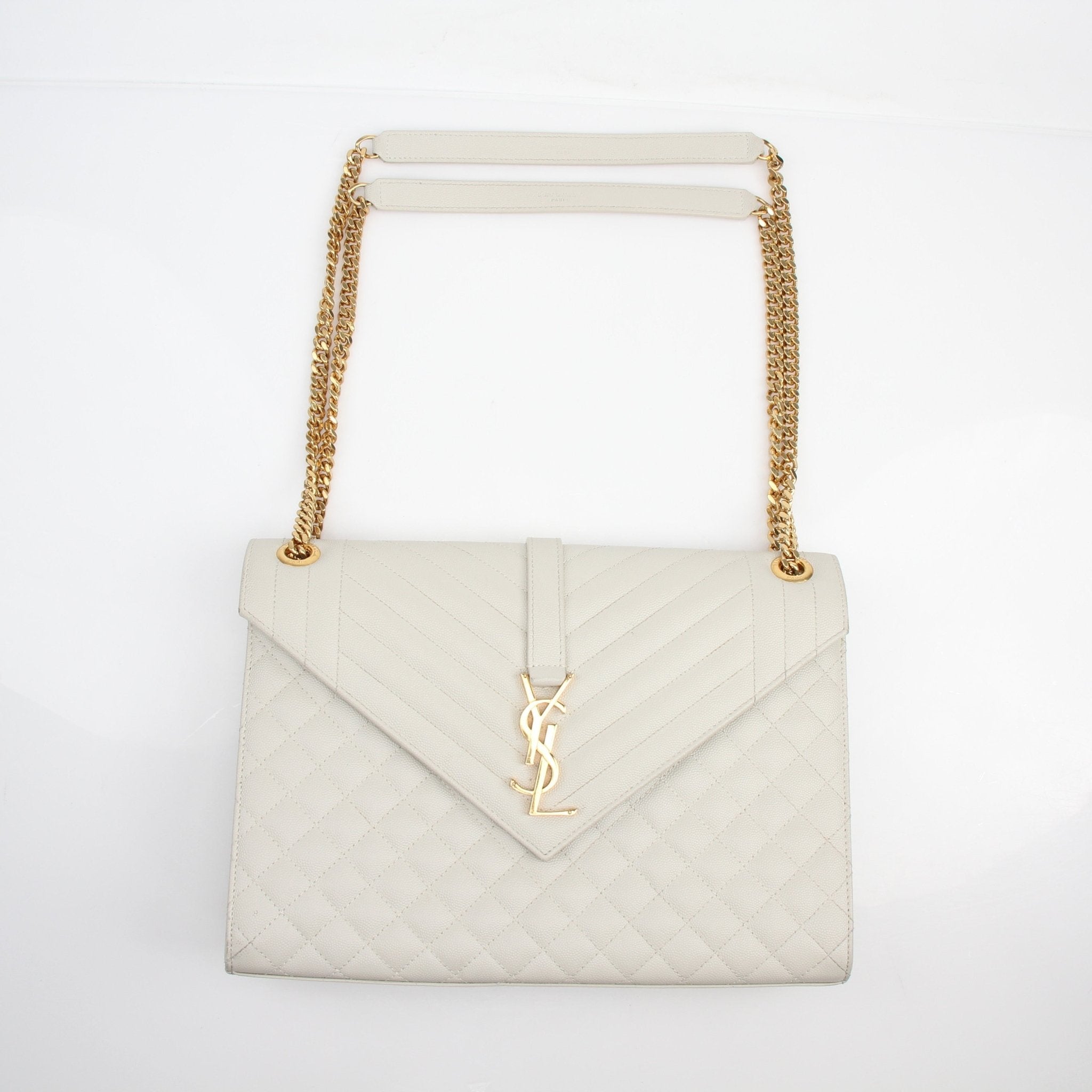 Gold & Beyond Saint Laurent Classic Monogram Large Envelope Satchel handbag with gold accents and sleek design.
