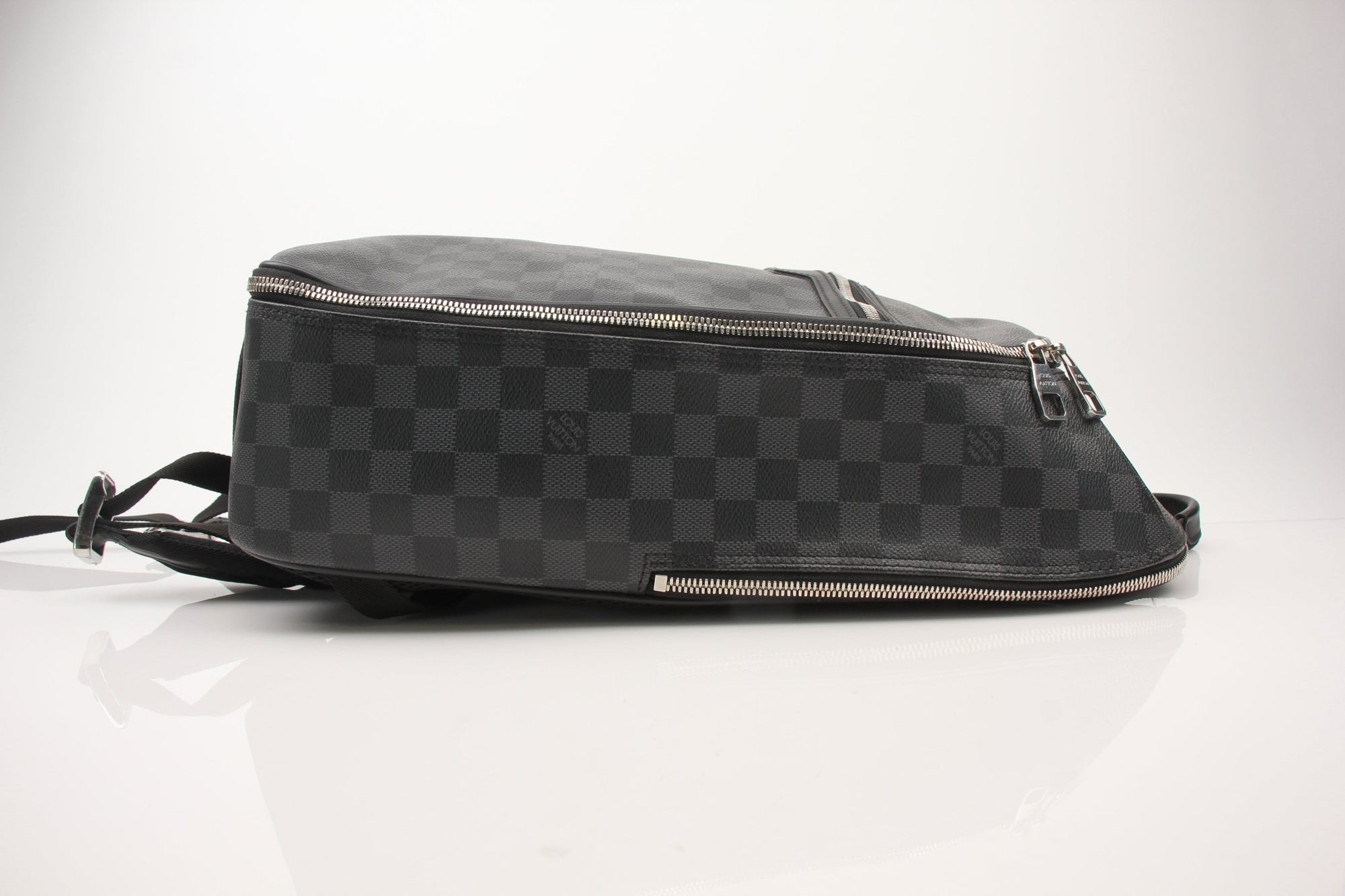 Louis Vuitton Michael Backpack, a stylish travel bag with leather accents and adjustable straps, designed for practical travel use.