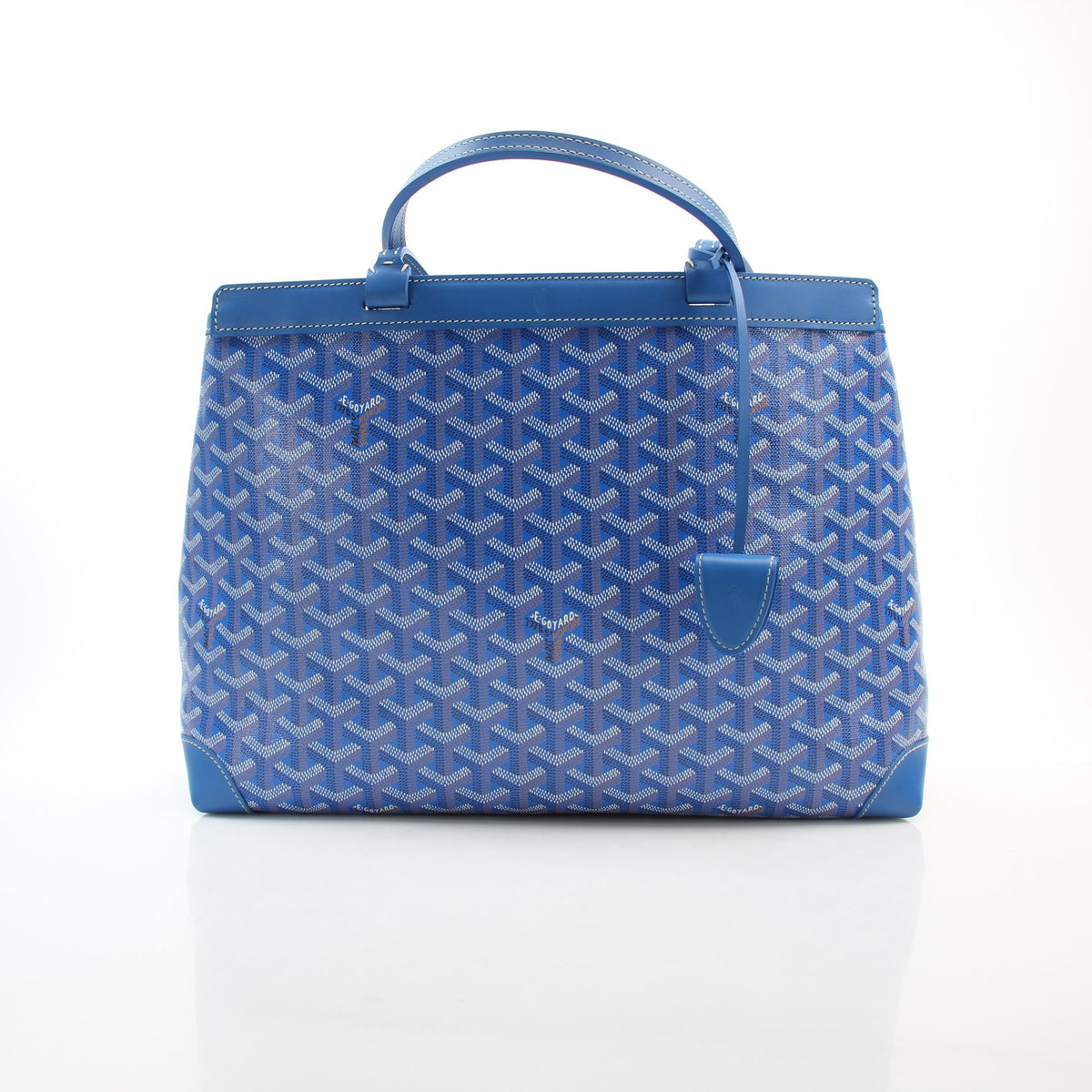 Blue Goyardine canvas MM tote bag by Goyard, structured handbag with leather trim and shoulder straps