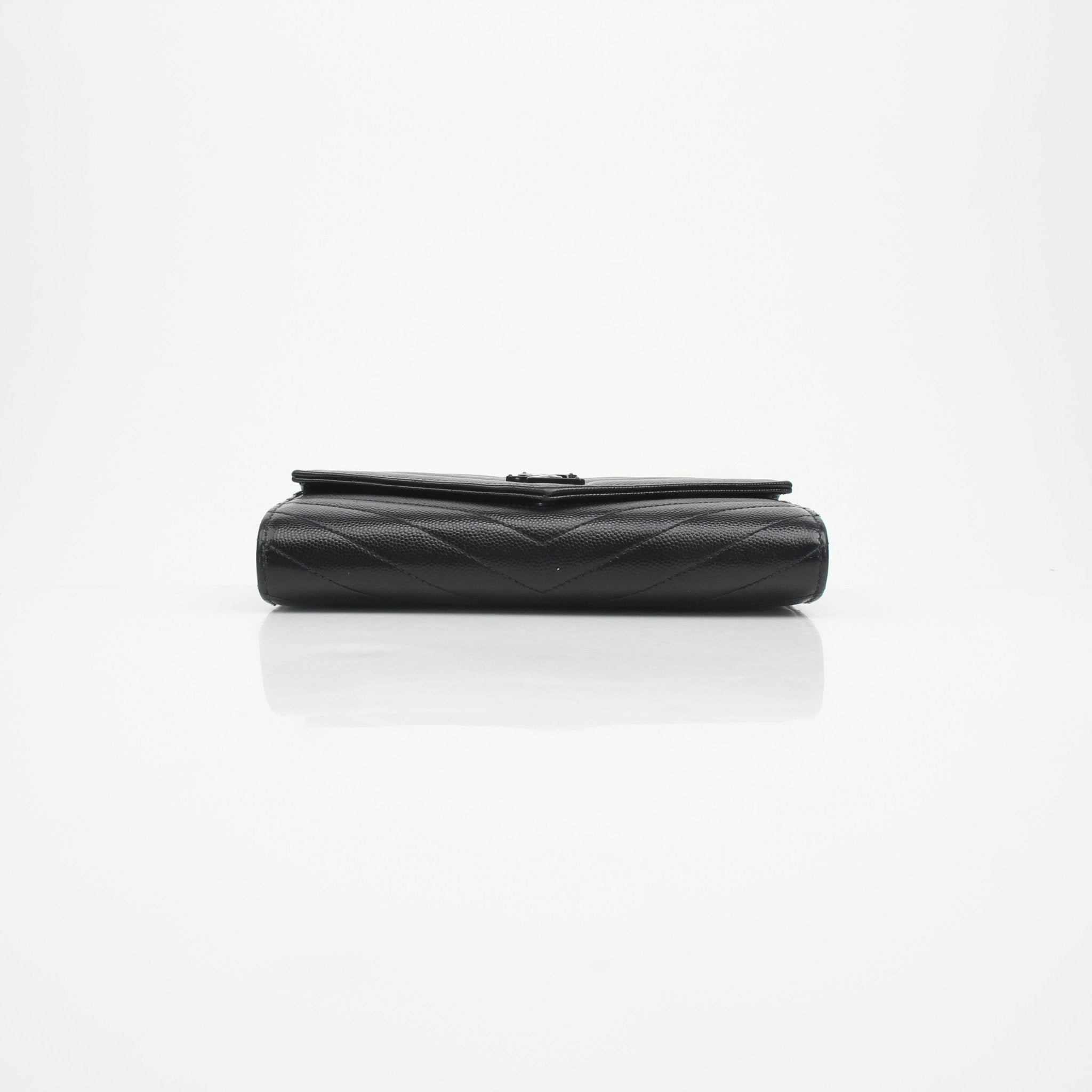 Gold & Beyond Saint Laurent Grain de Poudre Chevron Envelope Wallet handbag with textured leather and sleek design.