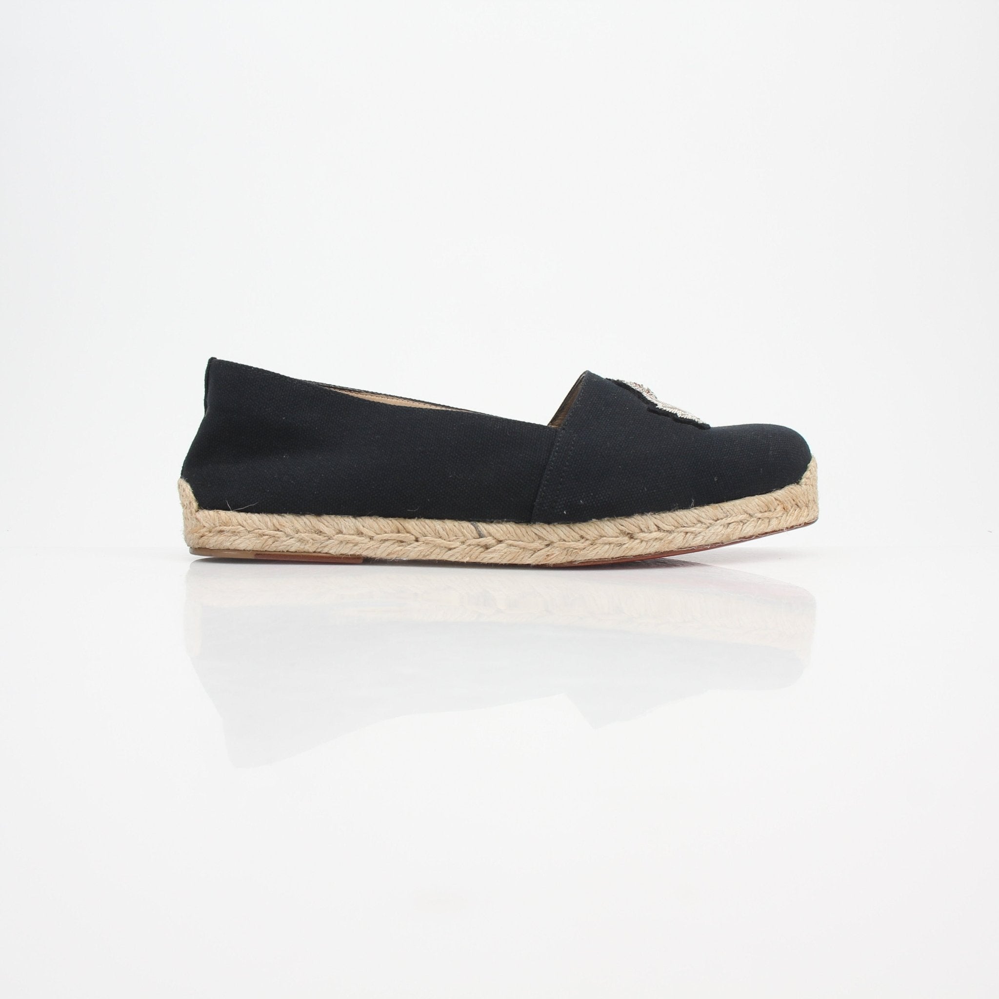 Christian Louboutin embroidered crest canvas espadrille flats with beige and red detailing, showcasing stylish slip-on shoes.