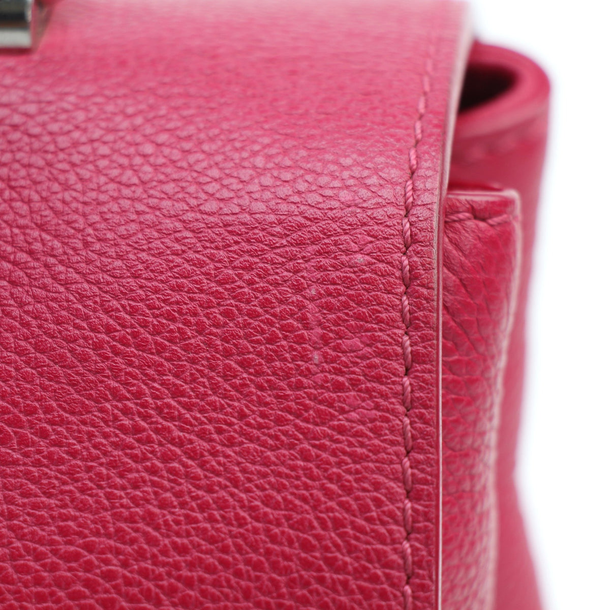 Pink calfskin leather Louis Vuitton Lockme II PM top handle handbag with structured silhouette and gold-tone hardware