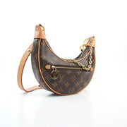 Louis Vuitton Brown Monogram Canvas Small Loop Half Moon Shoulder Bag handbag with curved silhouette and gold-tone hardware