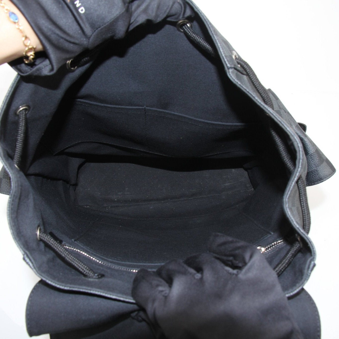 Louis Vuitton Christopher Backpack from Gold &amp; Beyond, stylish travel bag with leather accents and spacious compartments.