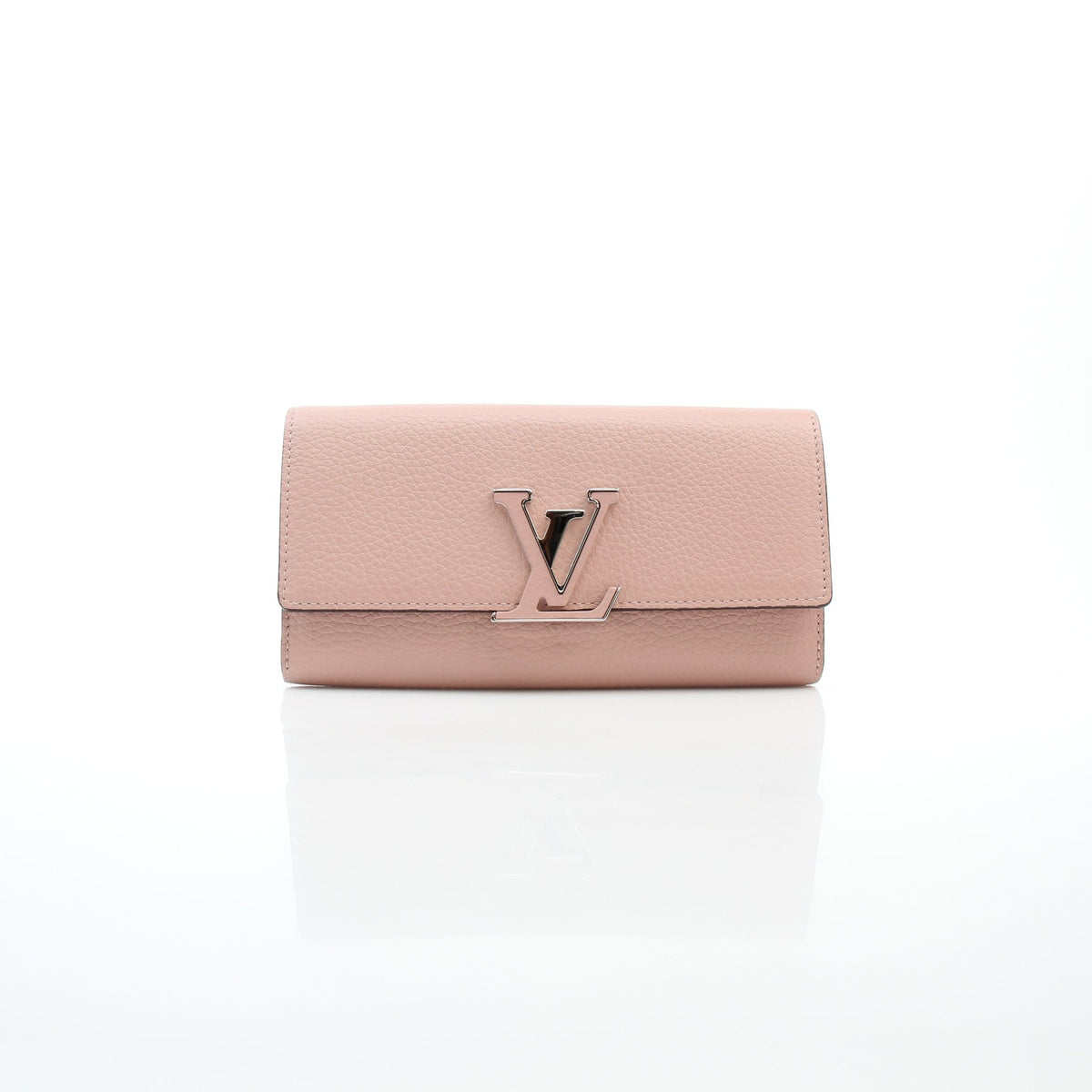 Light pink Taurillon leather Capucines wallet by Gold & Beyond, showing the compact handbag design