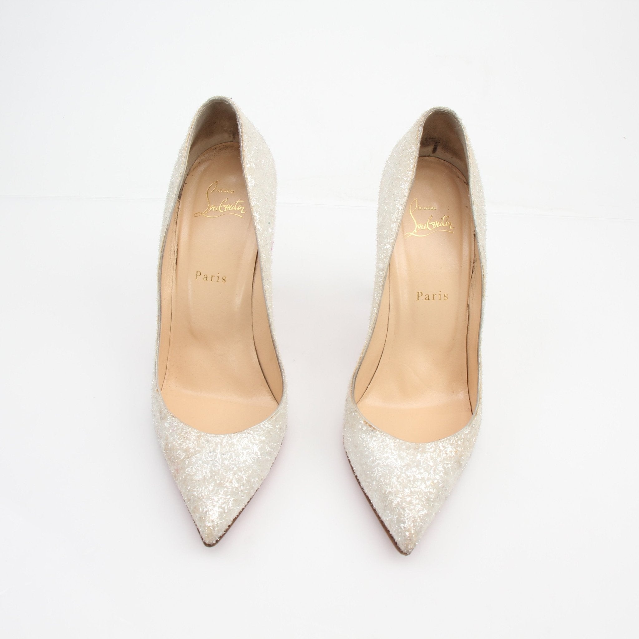 Christian Louboutin Pigalle Follies Givre glitter heels with pointed toes and shimmering gold accents, stylish footwear for elegant occasions.