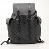 Louis Vuitton Christopher backpack in black leather, stylish travel bag with multiple compartments, by Gold & Beyond.